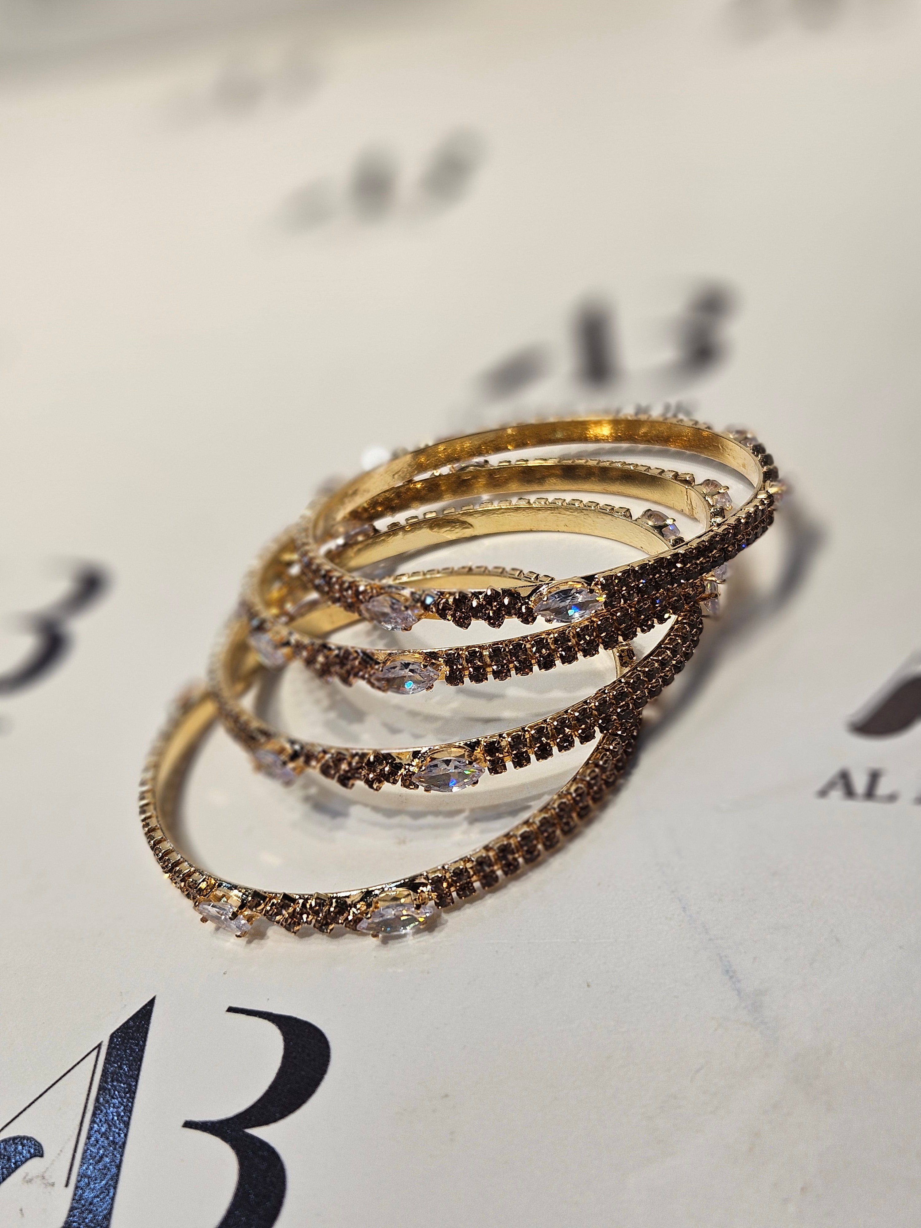 Set of 4 Womans Gold Bangles